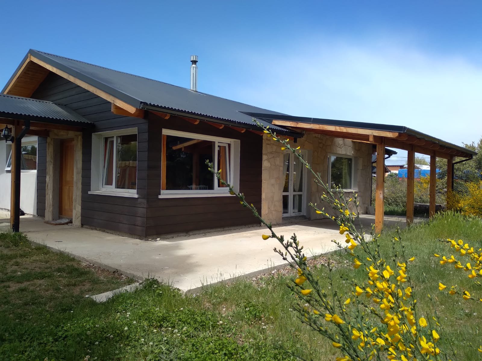 Cabaña con Patio y Parrilla